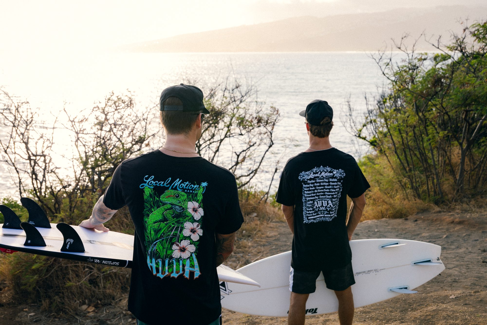 Team riders overlooking the coastline